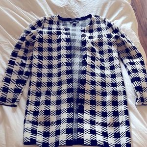 Black and white cardigan in size XS small. It has a nice weight to it.
